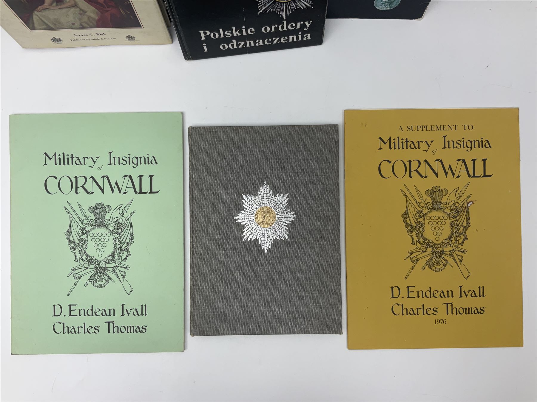Five reference books on medals and orders including Vaclav Mericka: Book of Orders and Decorations; Polskie ordery i odznaczenia; James C. Risk: The History of the Order of the Bath; Guide des ordres, decorations et medailles militaires 1814-1963; etc; together with two works on Cornish Military Insignia; and Insignes De la Legion Etrangere (8)