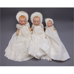  Three Armand Marseille 'My Dream Baby' bisque head dolls, each with moulded hair, sleeping eyes, open mouth with teeth and composition body with jointed limbs, one marked 'AM Germany 351/2K' and two marked 'AM Germany 351/31/2K', largest H37cm (3)  