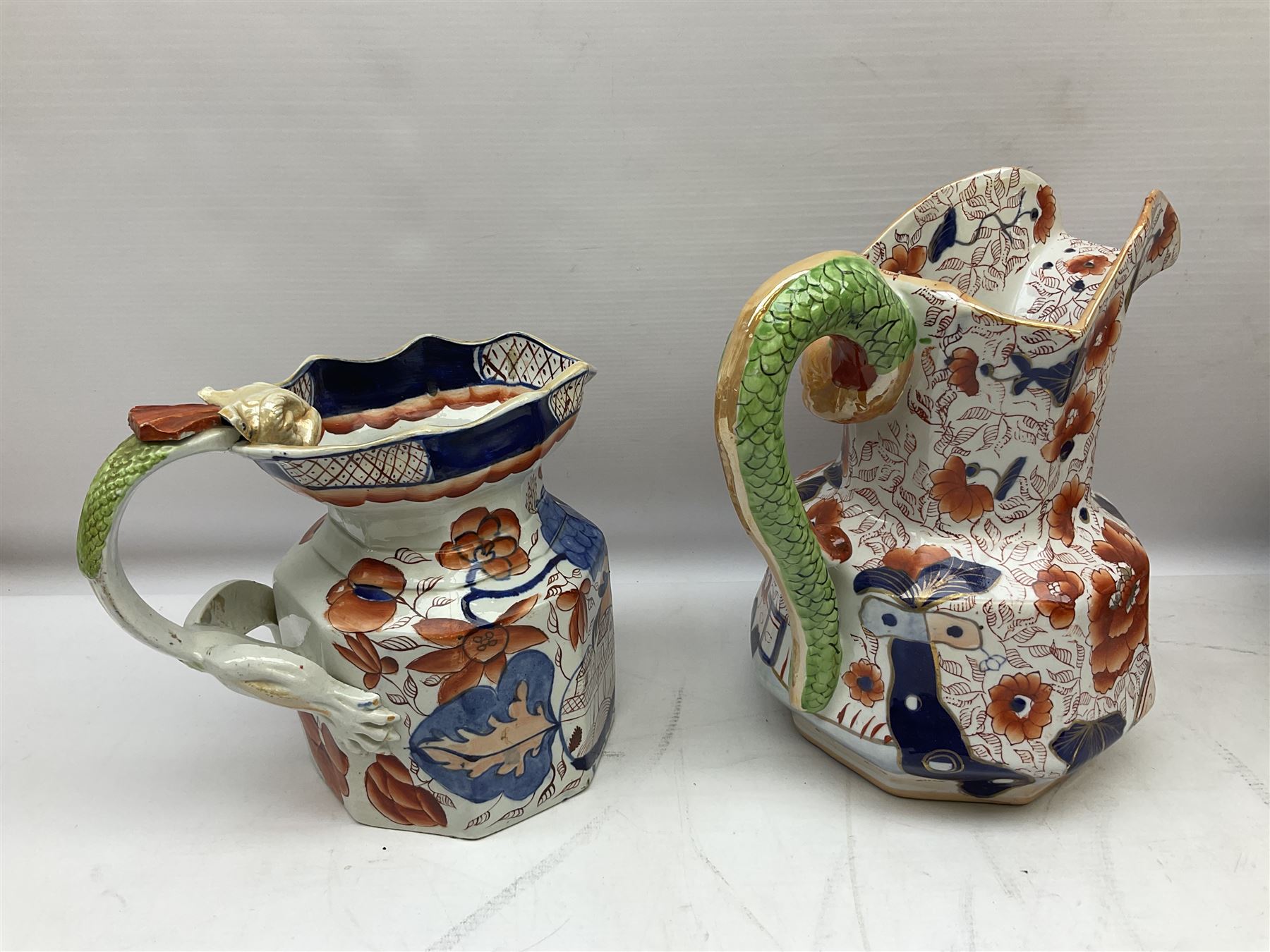 19th century ironstone wash jug and bowl set decorated in the Imari palette, together with two further smaller ironstone jugs similarly decorated, bowl D35cm