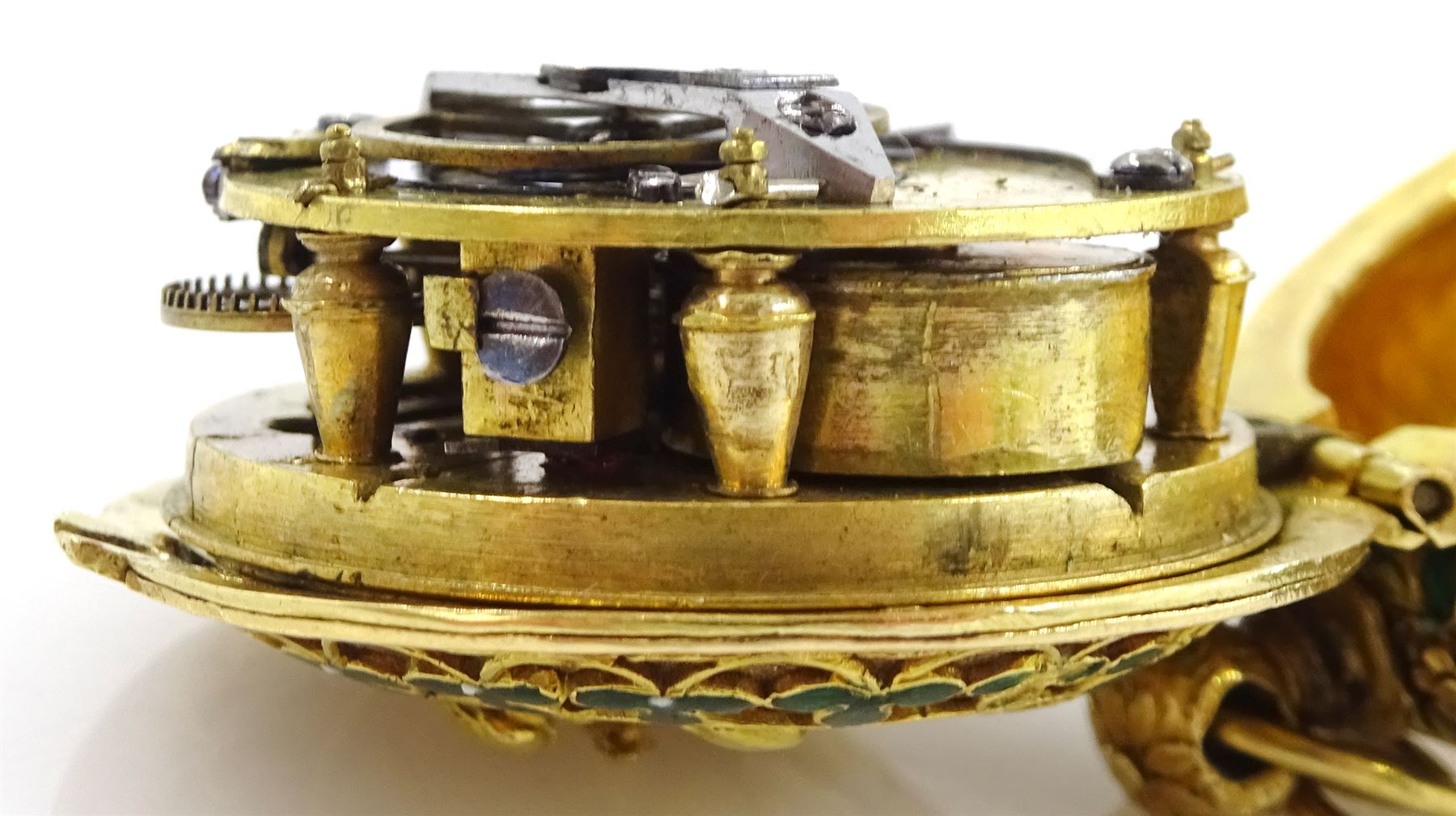 18th century 18ct gold fusee lever full hunter repousse pocket watch with later 19th century modifications to the movement, the 18th century case depicting figures in front of a tree with sheep in the background and enamelled leaf surround, the reverse depicting a classical scene with figures and horses, the side with enamelled bird and foliate decoration, 18th century polychrome dial with gilt hour hand, Roman numerals and quarter hour markers.