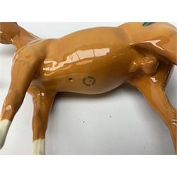 Collection of Beswick horses, including grey horse no.701, palomino foal no 836, grey stocky jogging mare no.855 etc, together two Royal Doulton horses, (8)