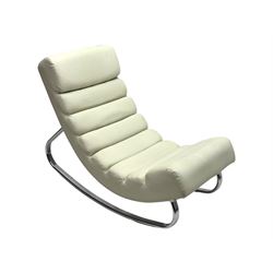 Cream leather modernist rocking chair, leather upholstery with horizontal channel stitching, supported by a chrome-plated tubular frame 