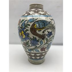Persian stoneware vase of baluster form, decorated with flowers and birds in a geometric border, H38cm