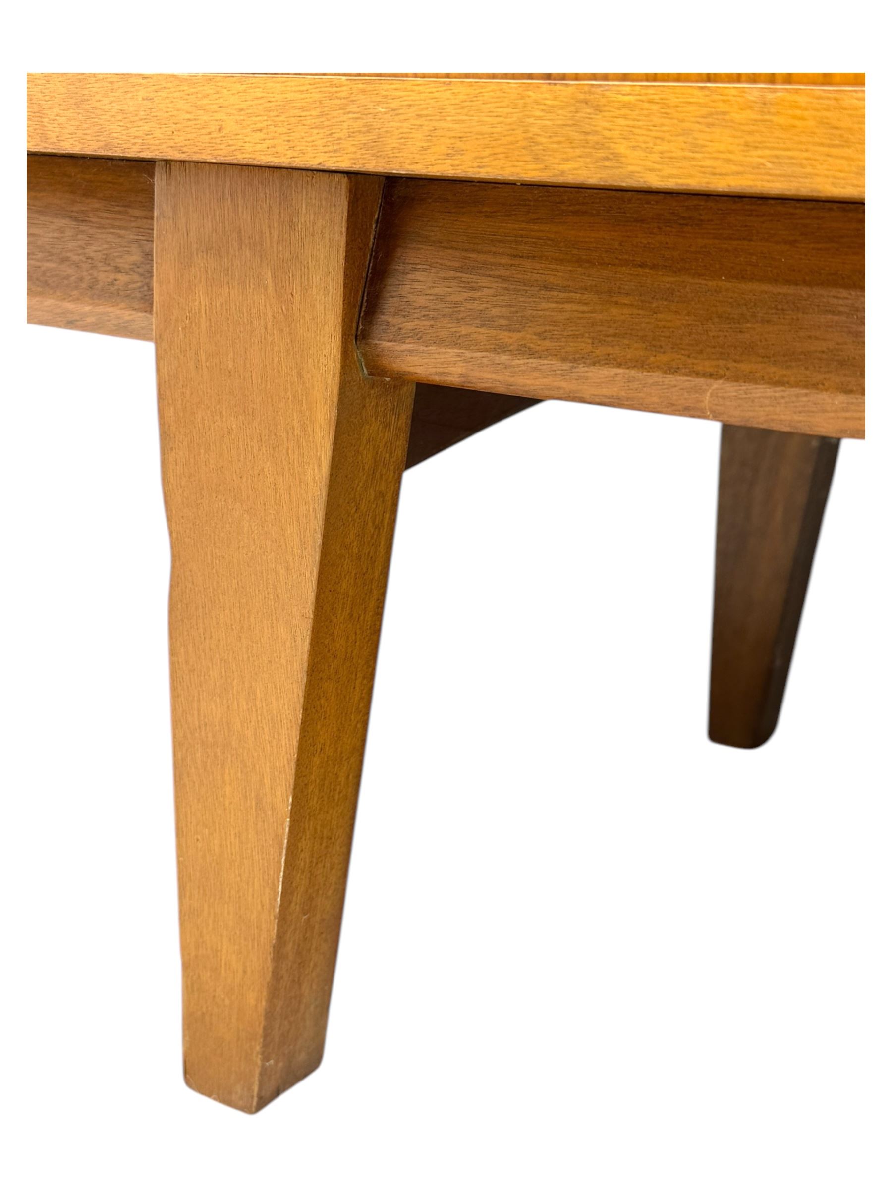 Younger - 1960s teak sideboard, three drawers over three cupboard, centre draw lined with baize with dividers, recessed handles with tapered feet