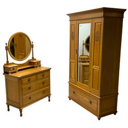 Late 19th century oak wardrobe, enclosed by rectangular bevelled mirror glazed door, fitted with single drawer to base (W118cm, H198cm, D42cm); together with a matching dressing chest, circular bevelled mirror over two short and two long drawers (W92cm, H159cm, D48cm)