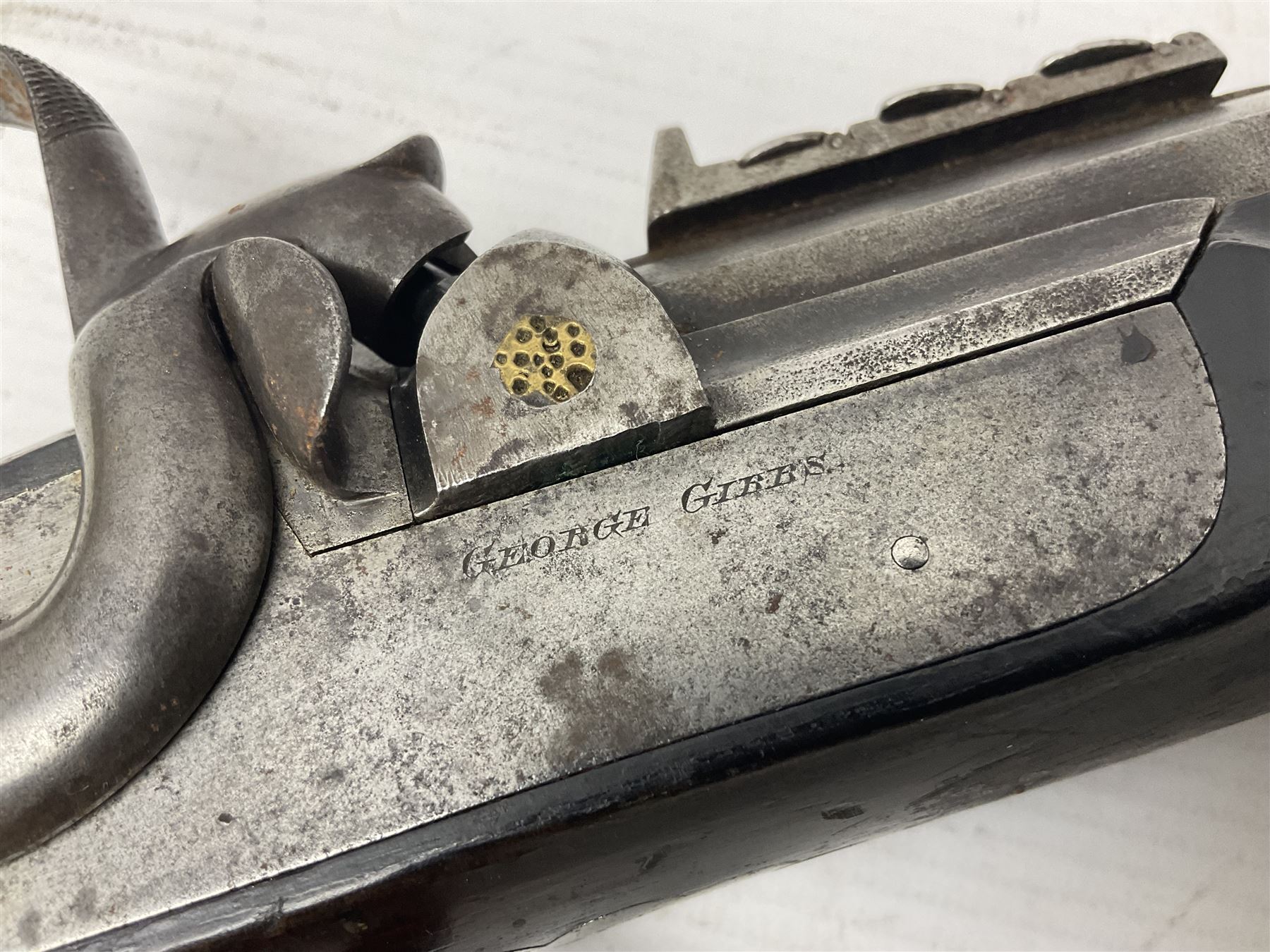 19th century George Gibbs of Bristol .461 cal. muzzle loading percussion match rifle with 28cm cut-down barrel and cut-down stock, Metford type rifling, fitted with additional three folding leaf rear sight to 400yds, back action sight still fitted to tang, maker's name to lock and top of barrel, serial no.439. L46.5cm overall