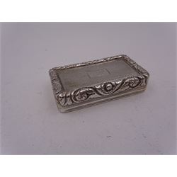 George IV silver snuff box, of rectangular form, with embossed foliate and scrolling rim, engraved cartouche and engine turned decoration to hinged cover, opening to reveal gilt interior, hallmarked John Bettridge, Birmingham 1824, L6.9cm