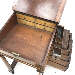 Early 19th century rosewood davenport, sloped hinged top enclosing two drawers and two false drawers with satinwood facias, four drawers, slide and hinged pen drawer, turned front supports on sledge platforms, on castors, W49cm, H86cm, D59cm