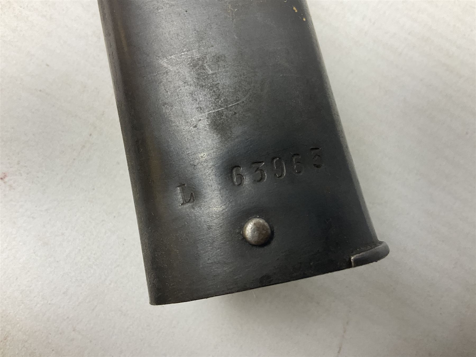 French Model 1866 Chassepot bayonet with 57cm curving fullered steel blade dated 1873 No.L63963; in steel scabbard with conforming number L71.5cm overall; and French St. Etienne Gras bayonet dated 1878 No.K10674 in steel scabbard numbered 79437 (2)