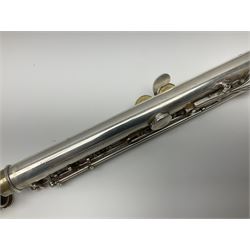 Boosey & Hawkes London Regent three-piece flute, serial no.345447; in B&H Bandhite hard carrying case; and Deg Music Company Inc. USA Claudel Model three-piece flute, serial no.491718, in hard carrying case (2)