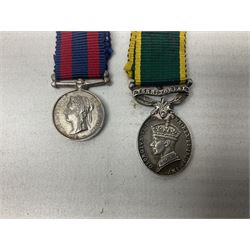 George V Military Medal and Distinguished Conduct Medal miniature group of seven medals comprising MM, DCM, WW1 trio including 1914 Star with date clasp and MID leaves, The Great Durbar Delhi 1911 Medal and LSGC; on pinned wearing bar; WW1 Military Medal miniature group of three comprising MM, BWM and Victory; Victoria North West Canada 1885 miniature; and George VI miniature Territorial Efficiency medal; all with ribbons