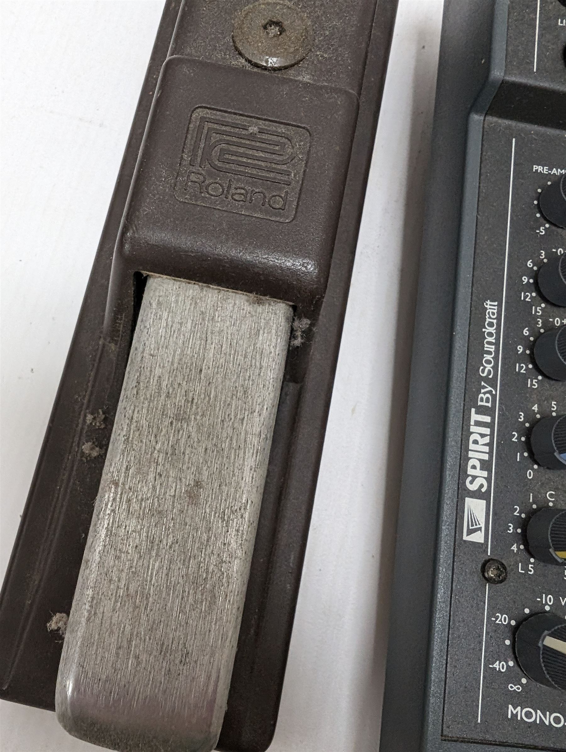 Spirit Folio Notepad mixer, together with a Roland pedal and a Suntech metronome tuner