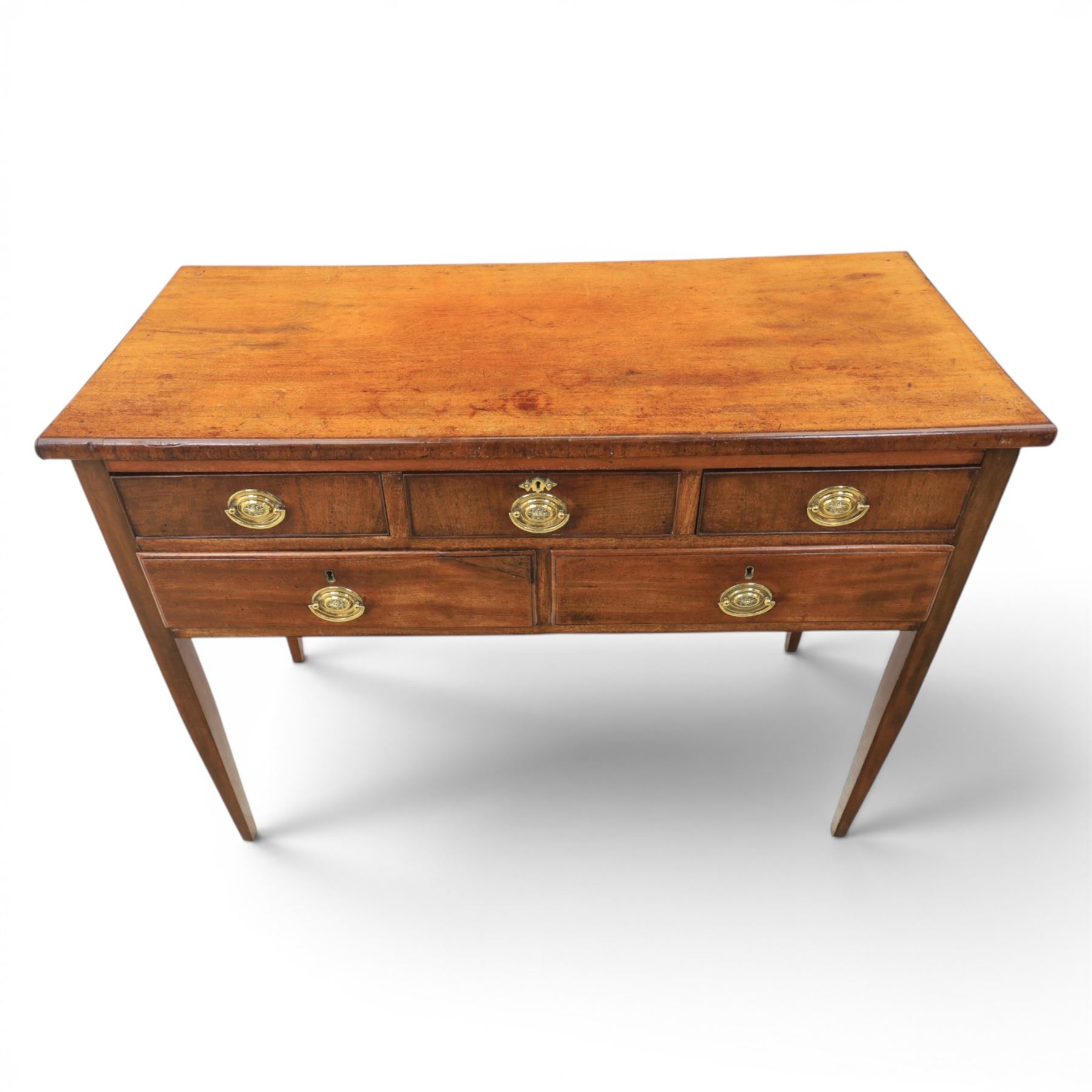 Georgian mahogany side table fitted with drawers, rectangular top over five drawers with brass handles, raised on tapering square supports