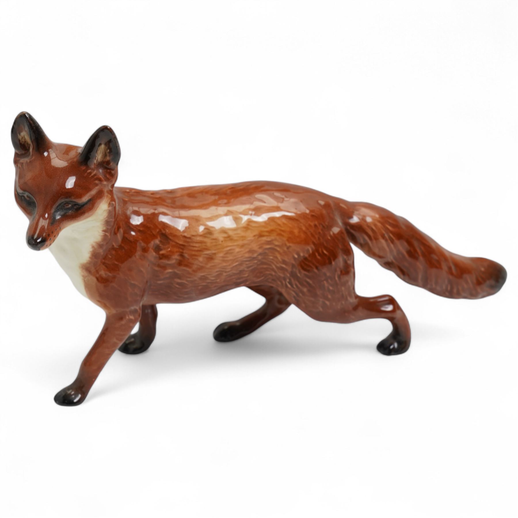 Six Beswick dogs comprising St Bernard No.2221, Greyhound No.972, Alsatian No.969. Whippet No.1786B, Cairn No.1055A and Retriever No.1855, two Beswick foxes and a harnessed horse