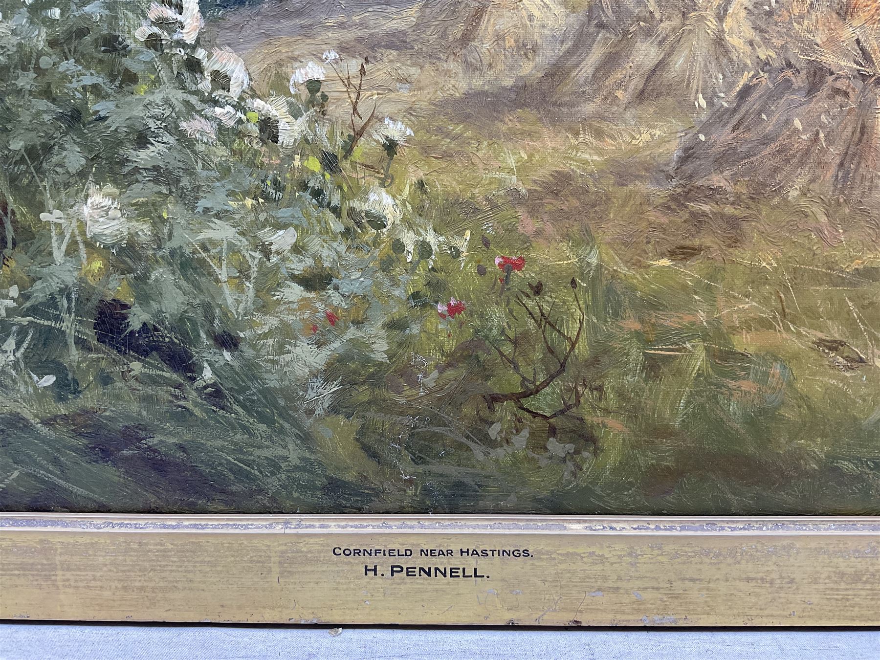 Harry Pennell (British 1879-1934): 'Cornfield near Hastings', oil on canvas signed, titled on the slip, further inscribed verso 60cm x 101cm 
