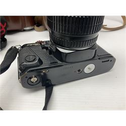 Collection of cameras and lenses, to include Pentax Program A camera body, serial no 123759, with 'Pentax-A zoom 1:3.5-4.5 28-80mm' len, Praktica EE2 camera body with 'Pentacon electric 1.8/50' lens etc, together with a Manfrotto tripod 