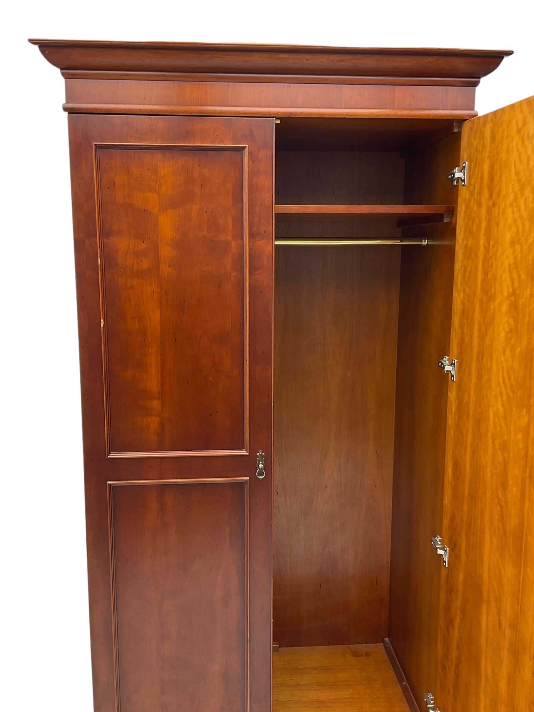 Cherrywood double wardrobe, the interior fitted with hanging rail and shelf