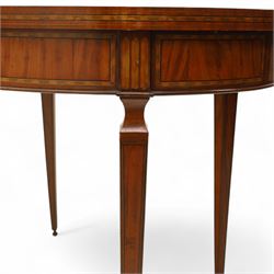 Aldam Heaton & Co (fl.1878-97) - late 19th century Sheraton revival style satinwood inlaid oval centre table, raised inlaid edge, centre with finely executed large central  inlaid medallion, surrounded by ribbon tied swags interspaced with medallions, frieze with rectangular symmetrical panels of foliate sprays of acanthus leaves, raised on four square section tapering legs with cavetti shaped shoulders with stringing on brass bulb feet, underside with bone plaque signed Aldam Heaton & Co, Baker St, London