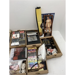 A very large collection of assorted Elvis Presley related memorabilia, to include books, records, CD's, tape cassettes, VHS's, ceramics, posters, etc. 