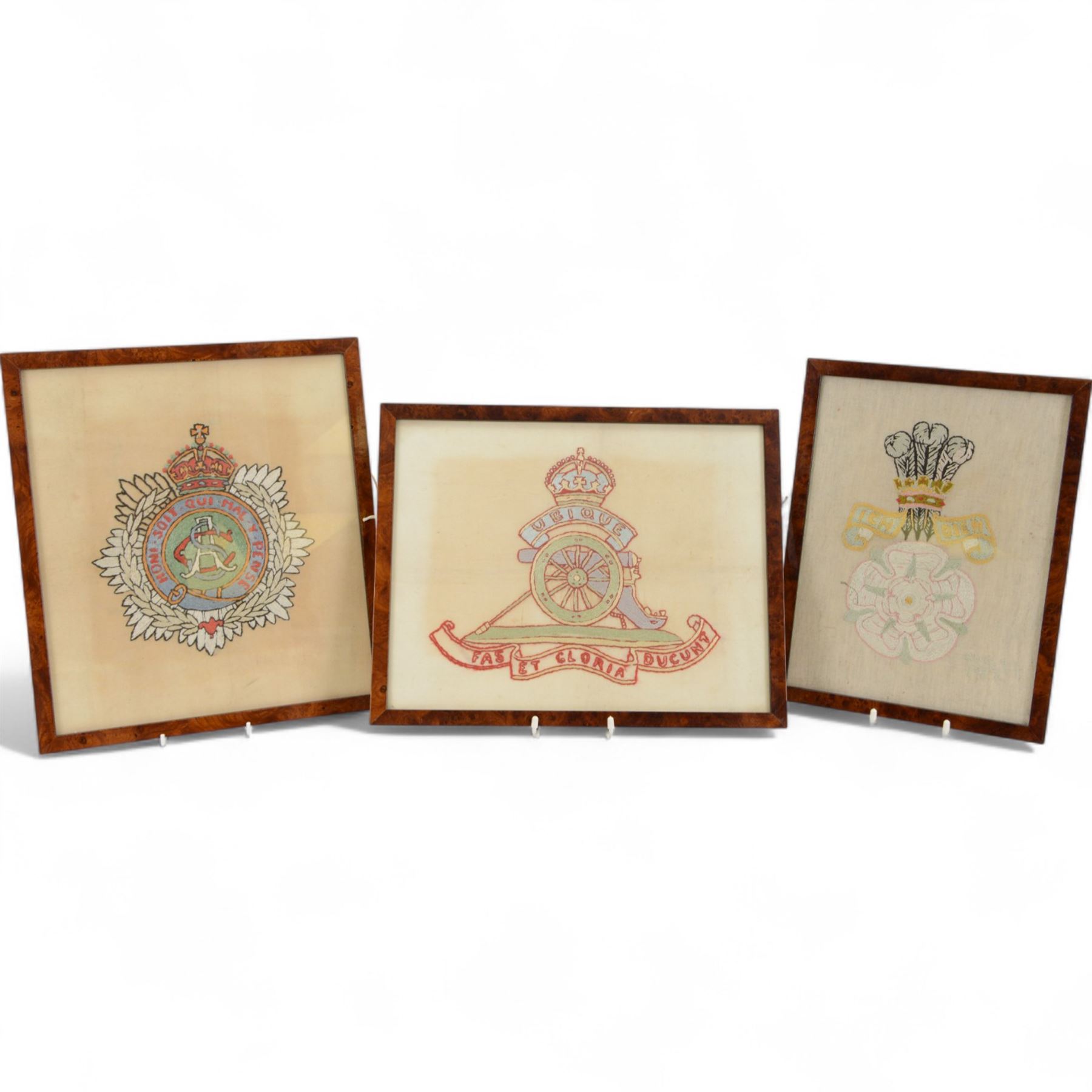 Three framed embroidered panels of military crests,  The Royal Regiment of Canadian Artillery, Army Service Corps and Yorkshire Yeomanry Hussars