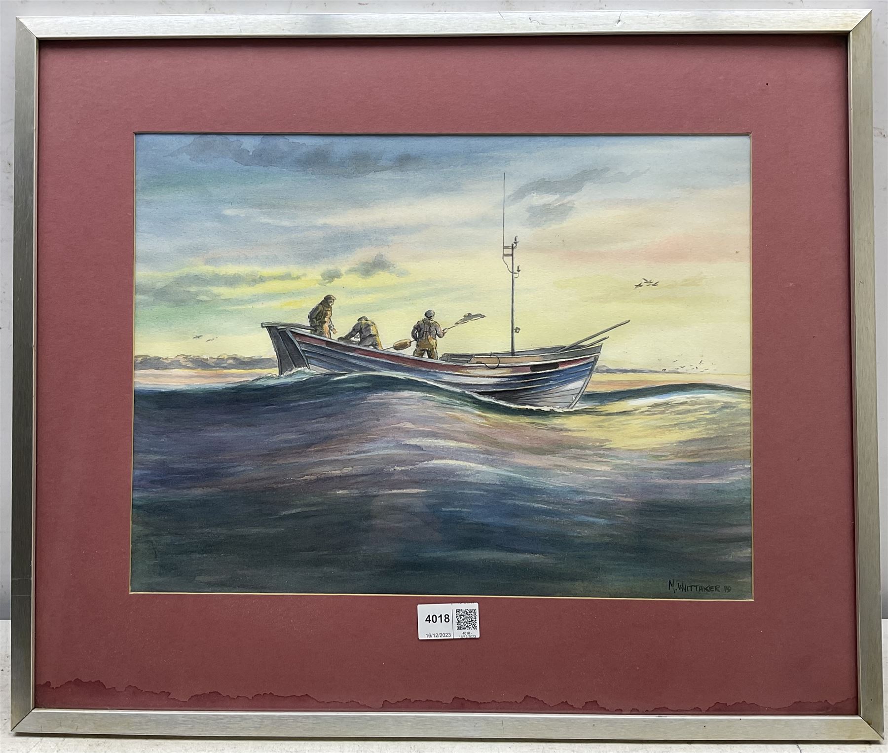 M Whittaker (British 20th Century): 'Dawn in the North Sea - A Filey Coble heads for the Fishing Grounds', watercolour signed and dated 76, titled verso 29cm x 39cm 