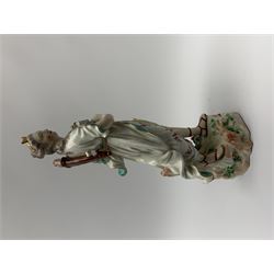 Mid 18th century Derby porcelain figure modelled as Dianna the Huntress, with quiver of arrows upon her back and dog by her side, upon a naturalistically modelled base, with patch marks beneath and collectors labels, H26cm
