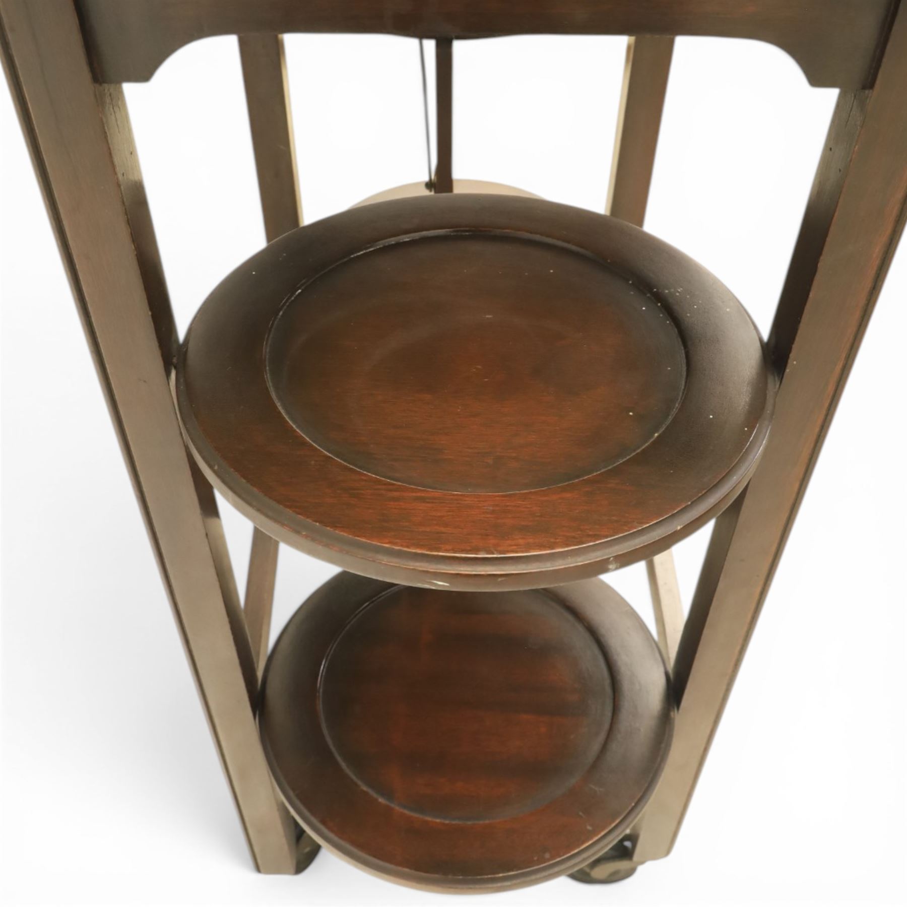 Early 20th century side table with double cake stand, rectangular moulded top, cake stands either side with support, raised on square legs terminating in castors