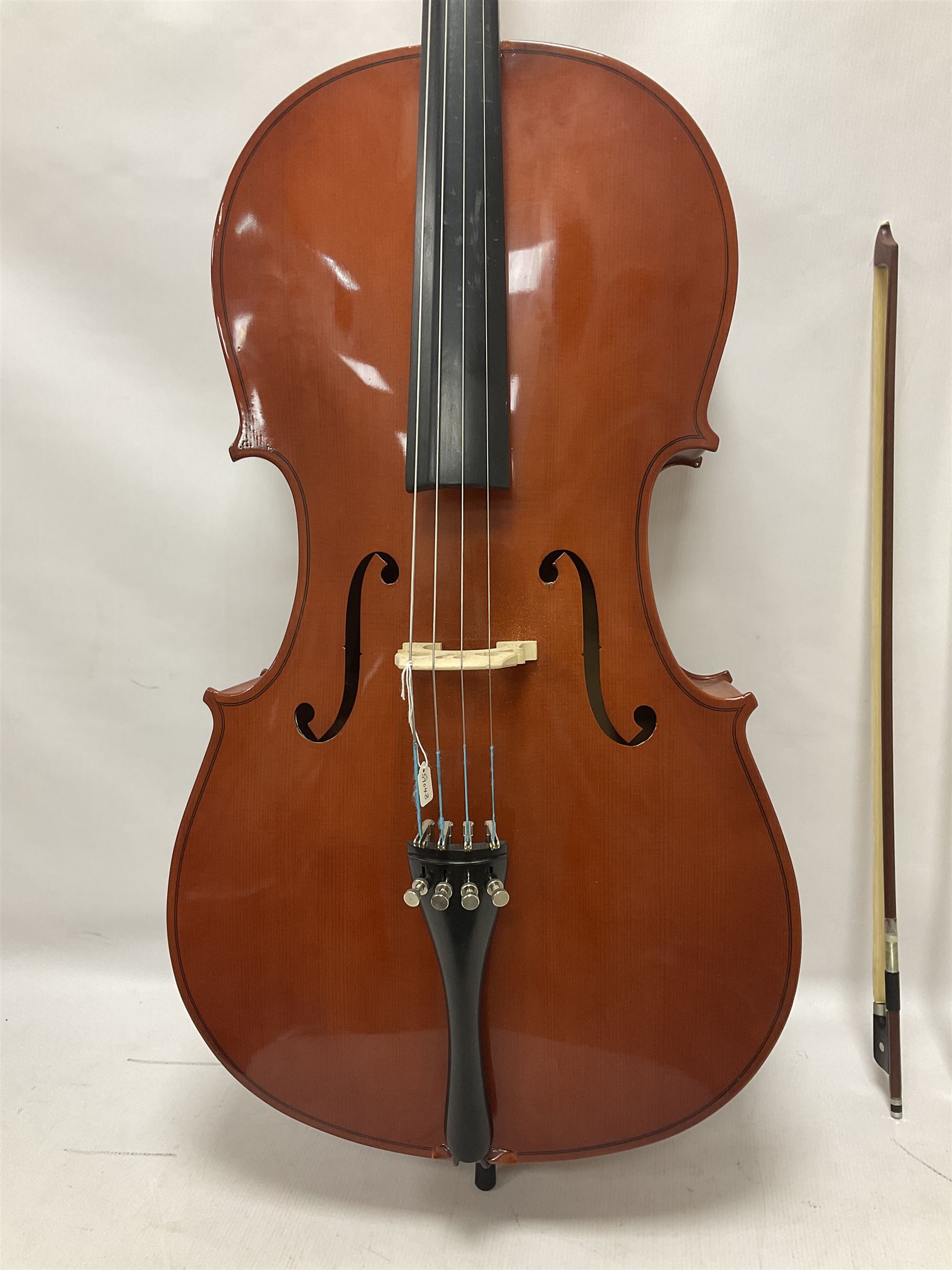 Gear 4 Music full size cello with a maple back and ribs and spruce top, ebony fittings and fingerboard, with two bows in hard case Length 123cm