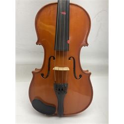 Three Primavera student violins - half-size with 31cm two-piece back; and two quarter-size each with 28cm two-piece back; each cased with bow (3)