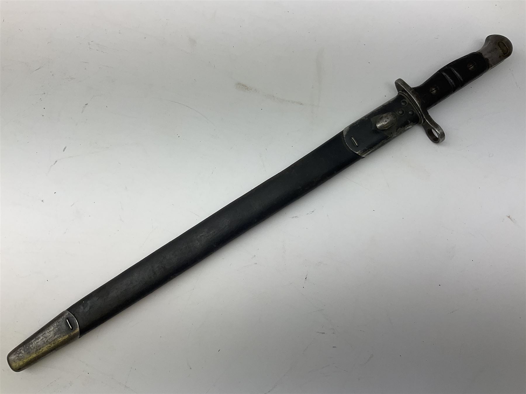 WW1 American Remington P14 rifle bayonet Model 1913, the 43cm fullered steel blade dated 5 17; in metal mounted leather scabbard L57cm overall; and WW1 Canadian Ross Rifle Co.1907 Model Mk.II bayonet, dated 2/17; in leather scabbard with frog (2)