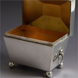 Early 20th century silver tea caddy, of sarcophagus form with twin lion mask mounted loop handles, upon four bun feet, hallmarked William Hutton & Sons Ltd, Birmingham 1913, H8cm, W9cm