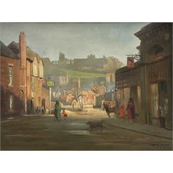 Donald Wood (British 1889-1953): 'Whitby from Station Square', oil on canvas signed and dated 1935, labelled verso 30cm x 40cm