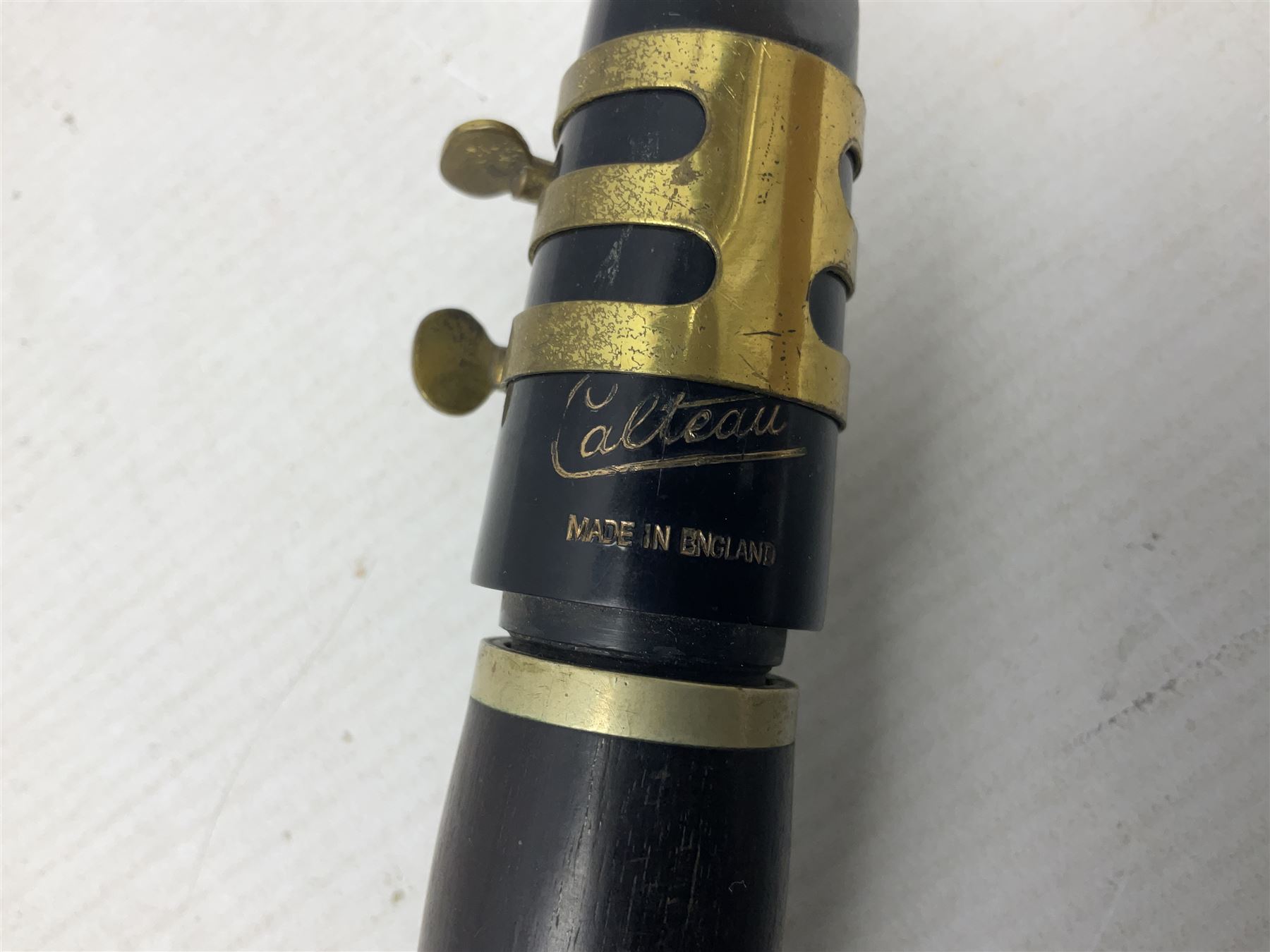 Disassembled early 20th century Boys Brigade snare drum D37cm with copy WW1 period photograph of the Kirbymoorside Boys Brigade; early 20th century hardwood clarinet; bagpipes chanter; and Dulcet E-flat penny whistle