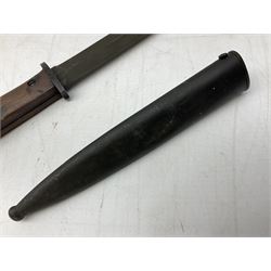Portuguese Model 1948 sub-machine gun knife bayonet with 17.5cm steel blade and cross-piece numbered 19363; in steel scabbard L31cm overall; and Yugoslavian Model 1948 bayonet numbered 87646 in steel scabbard (2)