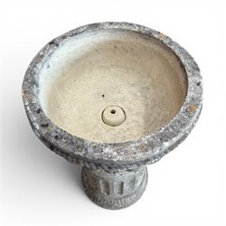 20th century good quality weathered cast stone pedestal urn of ecclesiastical design, circular lobed bowl with rope twist and lattice border, raised on squat base with fluted column  and acanthus decorated base