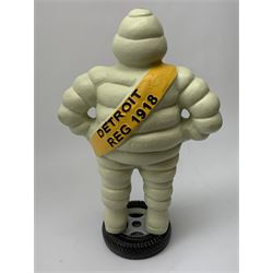 A cast iron Michelin man type figure, H40cm.