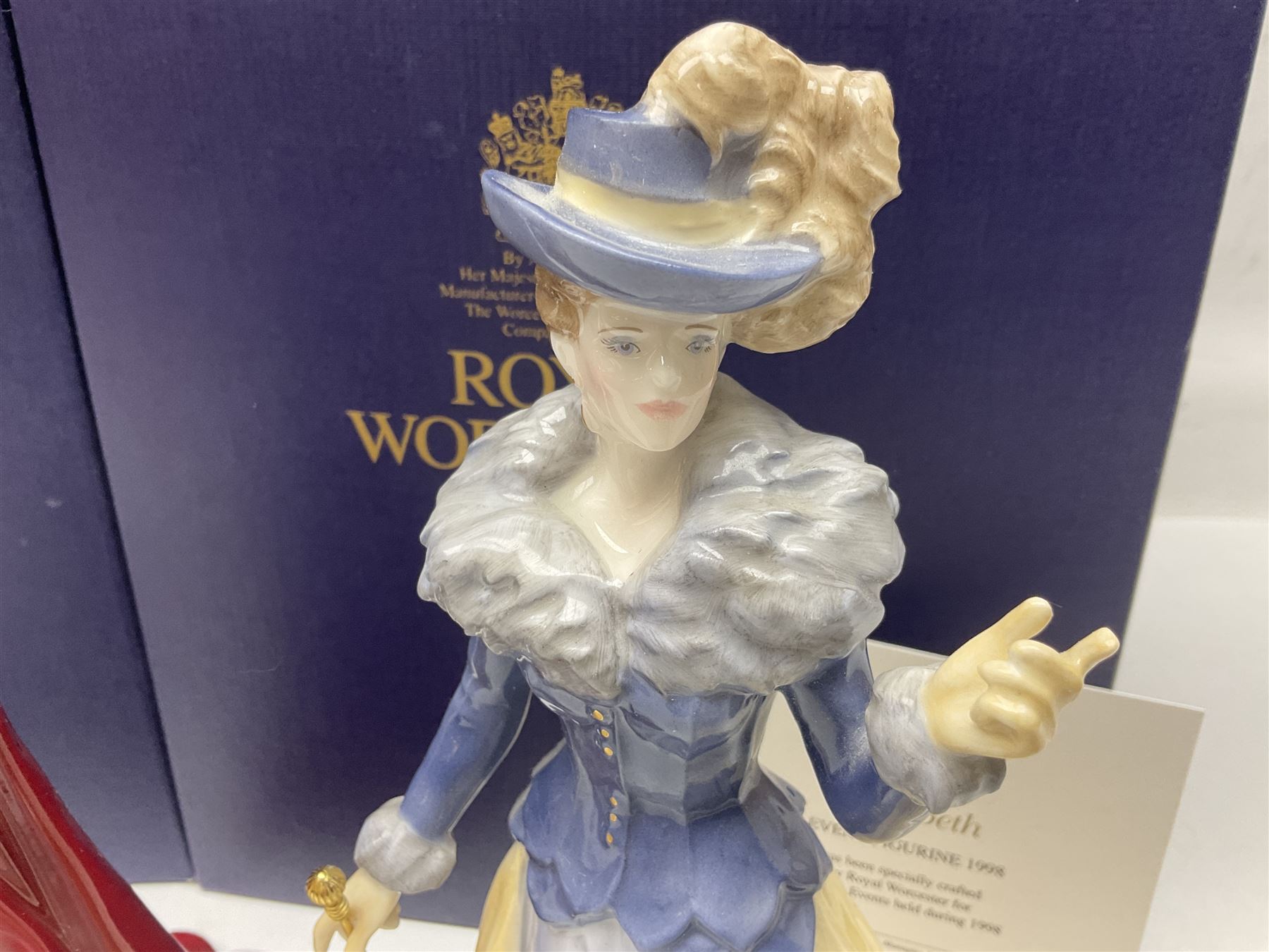 Three Royal Worcester figures, comprising Glyndebourne, with original box, Royal Worcester Special Even 1998 Elizabeth, with certificate and original box, and In Celebration of the Queens 80th Birthday 2006 