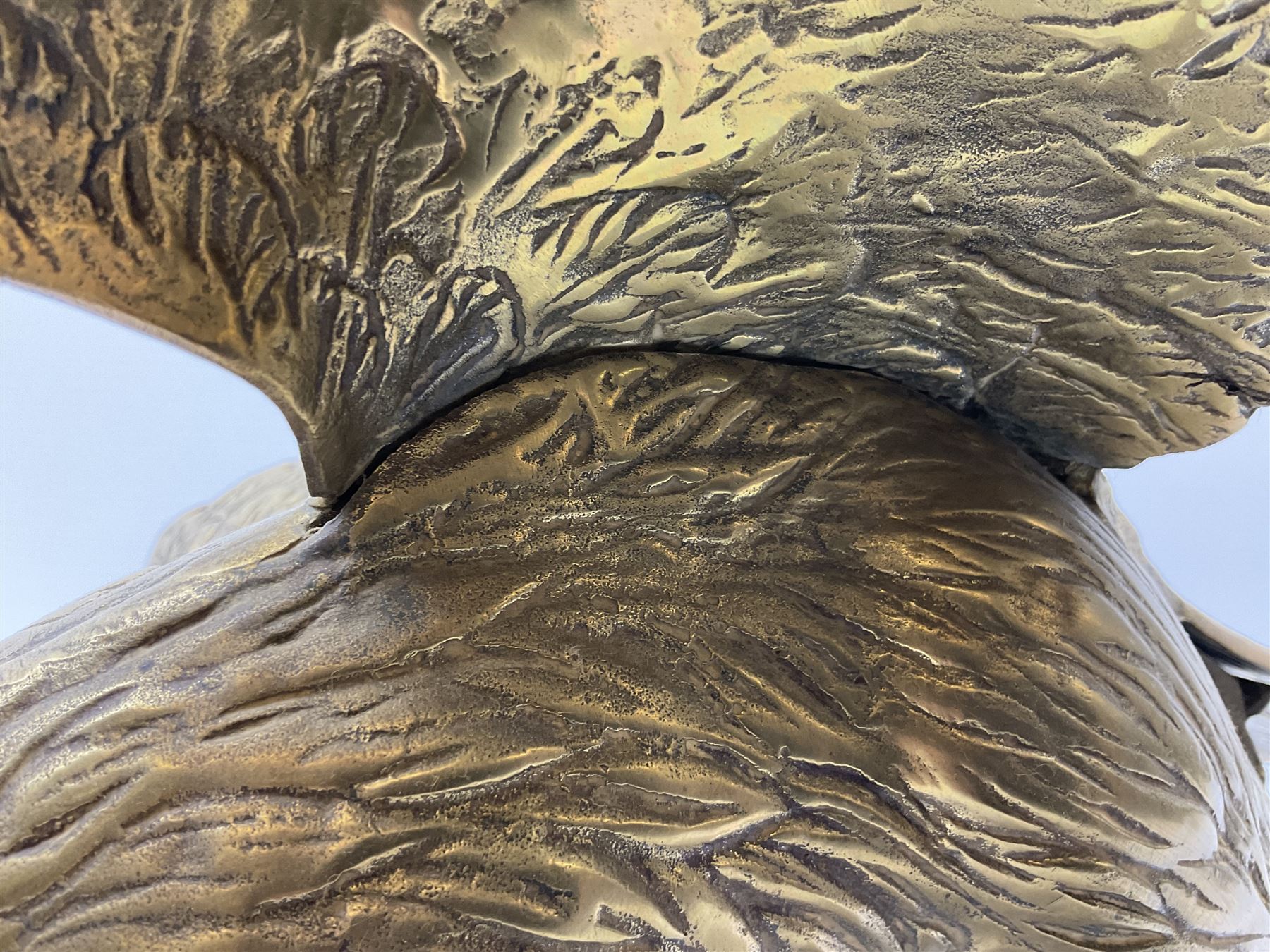 Large brass figure of an eagle on a branch, H51.5cm