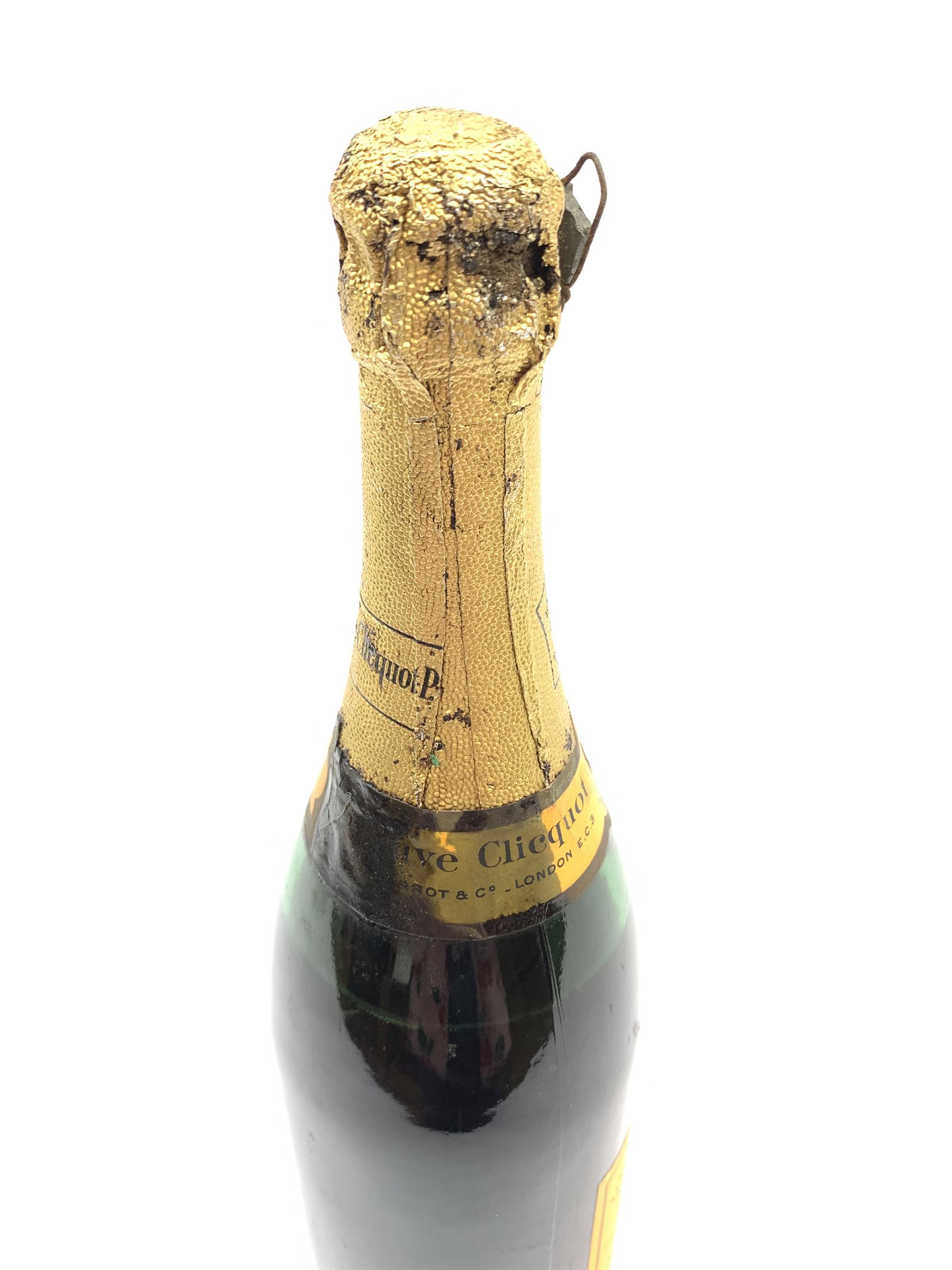 One bottle of Veuve Clicquot Ponsardin 1947 dry champagne, foil seal partially damaged, level below label