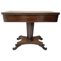 William IV mahogany tea table, rectangular fold-over top over banded frieze, tapering pedestal base with moulded vertical rails, on quadruform base with C-scroll feet