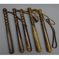  Five City of London Police turned hardwood Truncheons, some indistinctly stamped, one with detached leather wrist strap (5)  