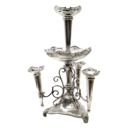 Large James Deakin and Sons silver plated epergne, c.1900, the central trumpet with pierced rim, above a large shallow bowl, upon a reeded column supporting three scrolling branches with conforming smaller trumpets, raised upon a triangular pierced base with three scroll feet, with marks beneath, JD & S, EPNS , and 'desk bell', T9518, H69cm