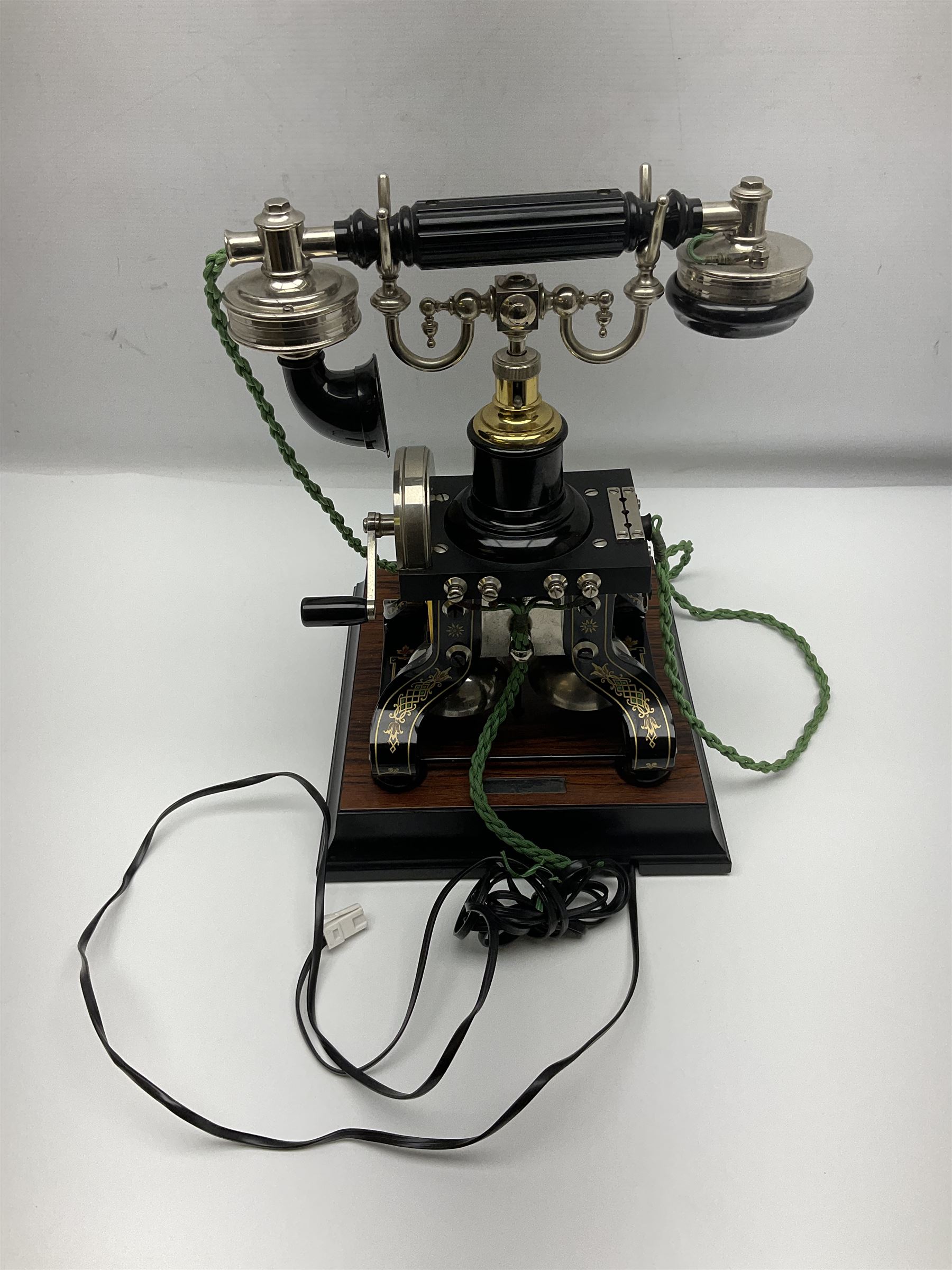 LM Ericsson of Sweden reproduction skeletal telephone, commemorating the centenary of the first 'Tax' in 1892, with gilded details on square walnut base with keypad and brass plaque beneath numbered 1892-09305, H35cm