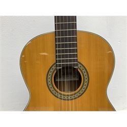 Nagoya Suzuki Model SC240 acoustic guitar with mahogany back and ribs and spruce top, bears label, L101cm; in soft carrying case