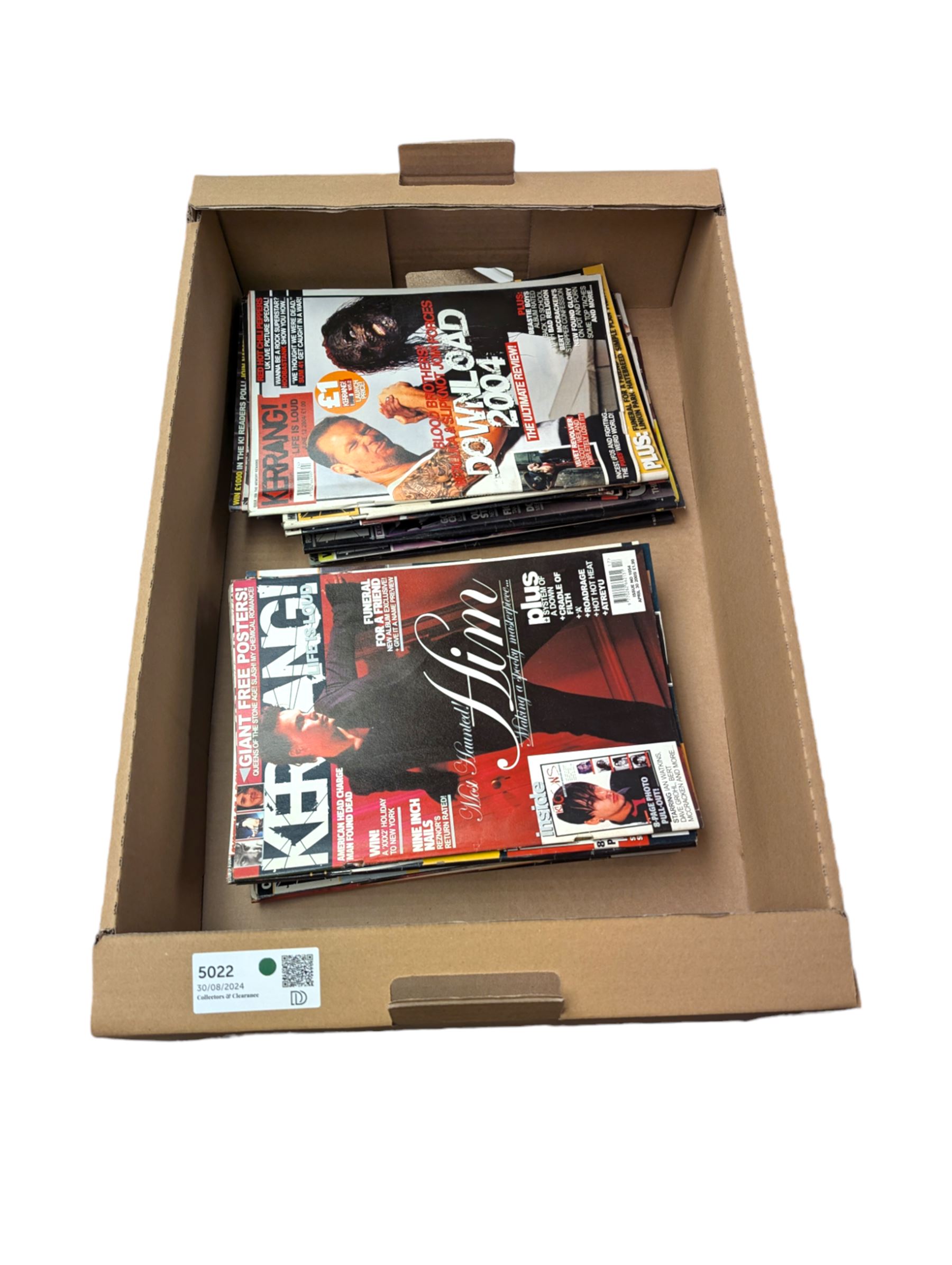 Thirty four early 2000s Kerrang magazines 