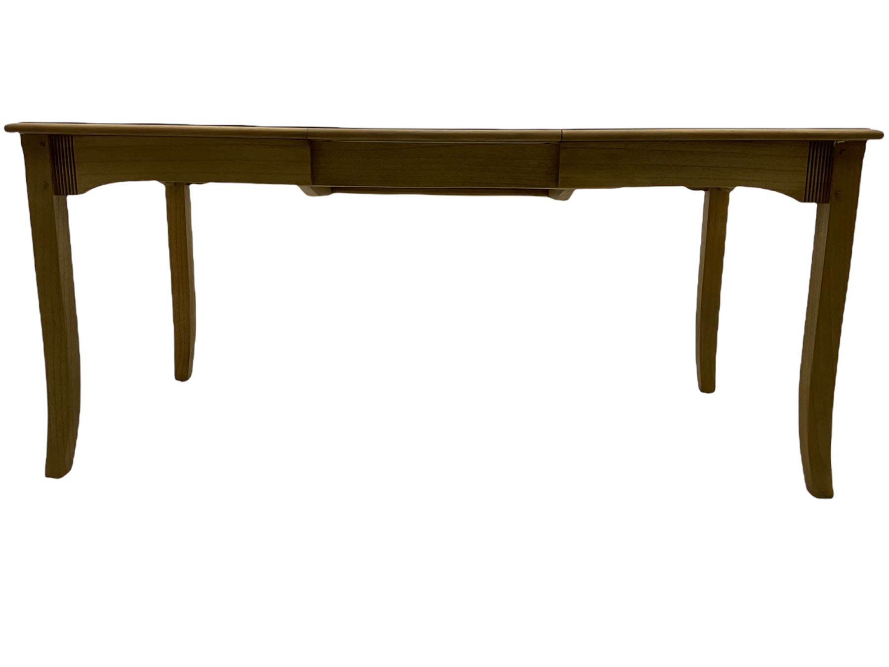 Windsor by Mark Devany oak rectangular extending dining table, with butterfly leaf, and four chairs with upholstered seats and backs