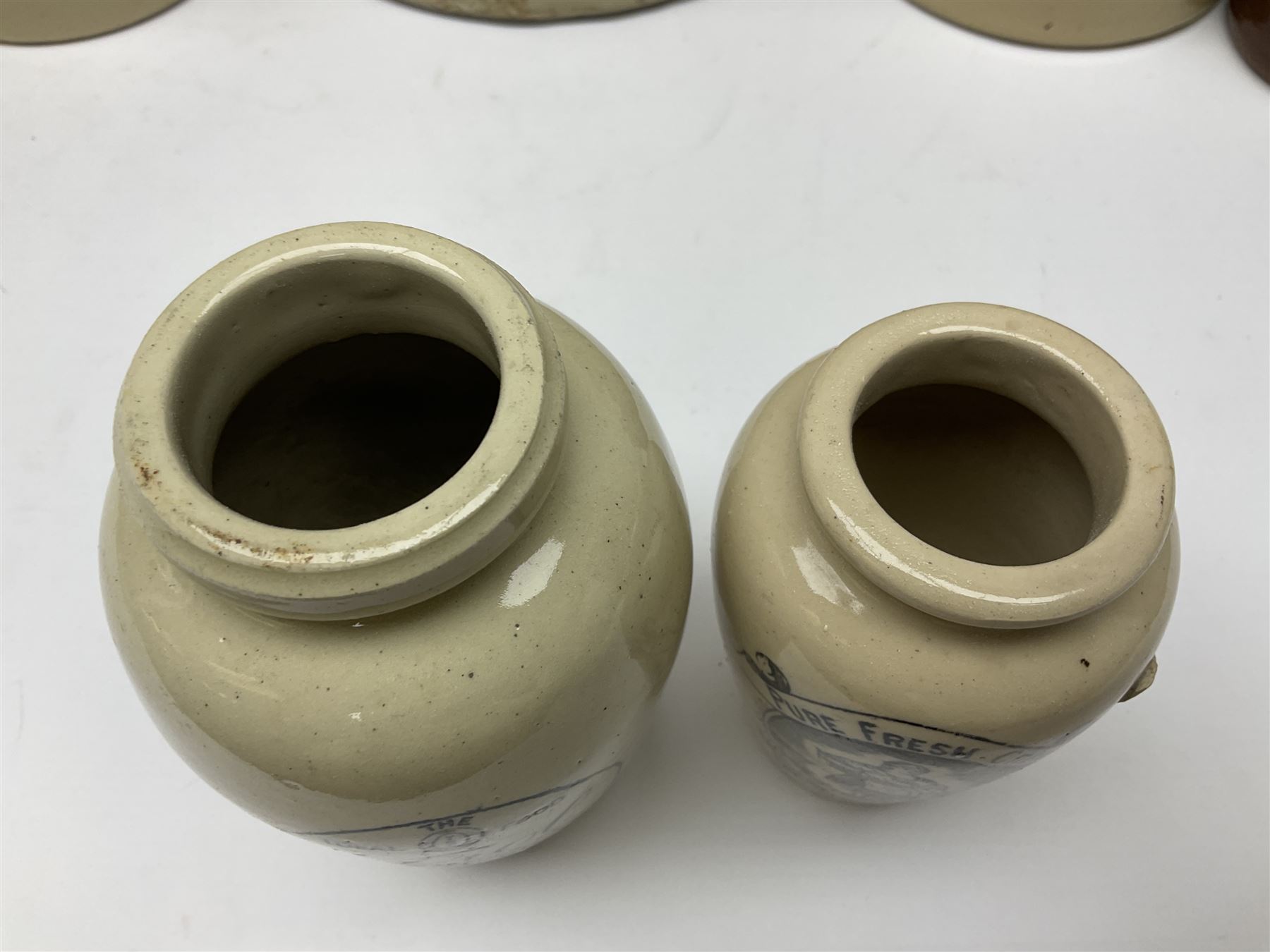 Large 2 gallon stoneware flagon, stamped 'John Soulby Wine Merchant Malton 2 Gall', together with a collection of similar stoneware jars and bottles, largest H40.5cm