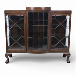  20th century large mahogany breakfront bookcase, with astragal glazed doors revealing an adjustable glass shelved interior, raised on ball and claw feet 