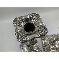 Pair of late Victorian silver mounted candlesticks, each of knopped and part fluted form, upon square stepped base with anthemions to each corner, with conforming sconces, hallmarked to removable sconces and foot, Thomas A Scott, Sheffield 1901, H25.2cm