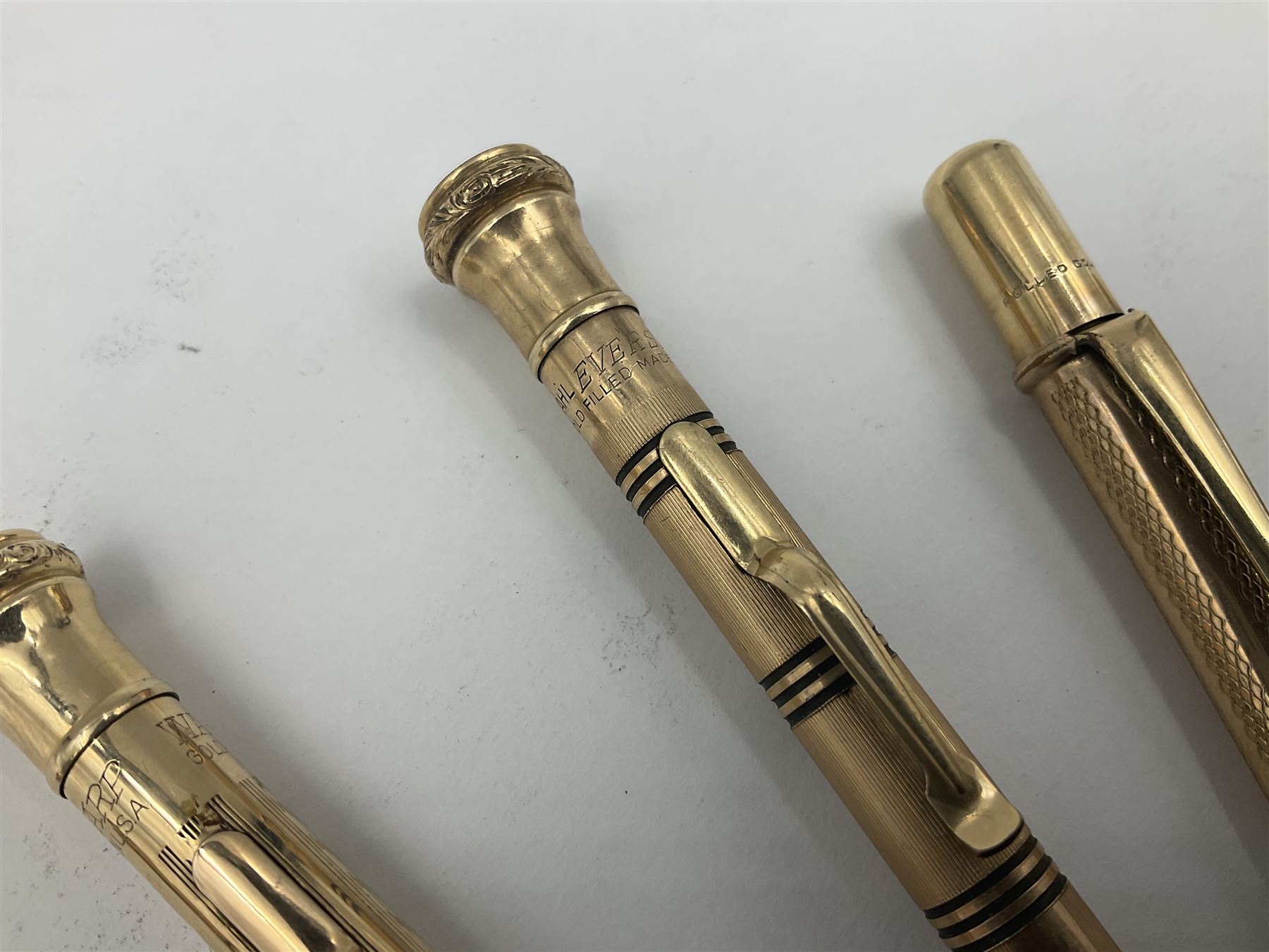 Five gold filled Wahl Eversharp propelling pencils, together with a silver propelling pencil, hallmarked London 1946, J.M.Co Johnson, Matthey & Co, and two further gold filled propelling pencils, one with box, largest L13cm (8)